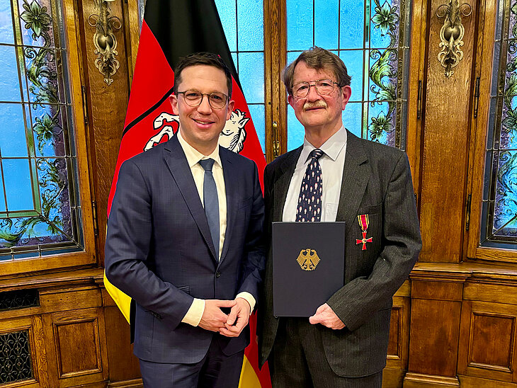 Minister Falko Mohrs und Prof. Dr. Jörg Hartung