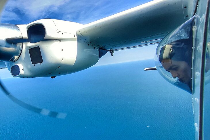 The aircraft have special windows that allow researchers to scan the water surface.