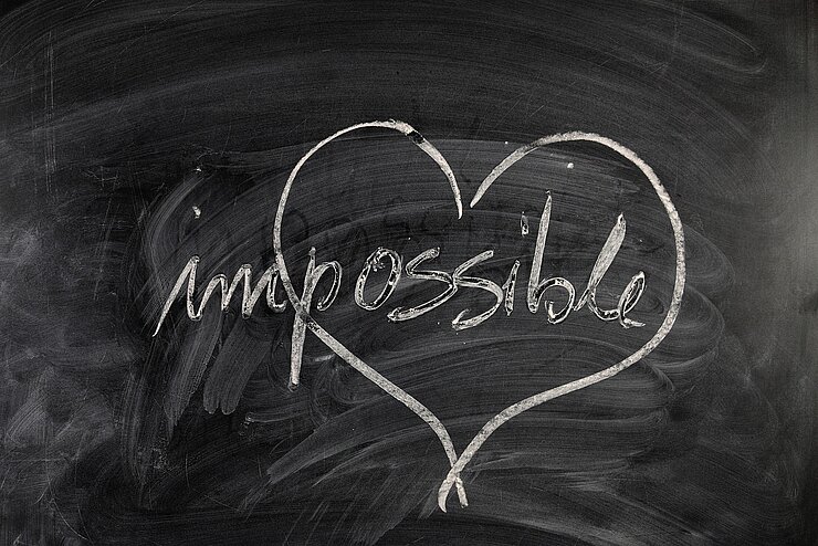 Ein Herz mit der Aufschrift "impossible"
