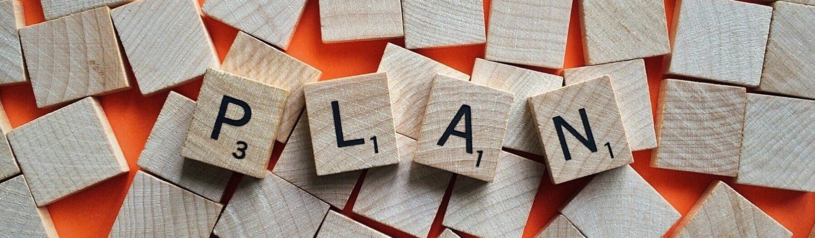 Scrabblebuchstaben "Plan"