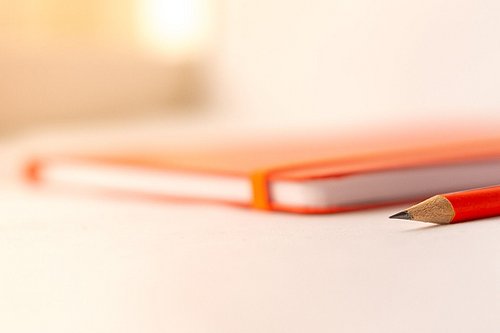 Notizbuch und Bleistift