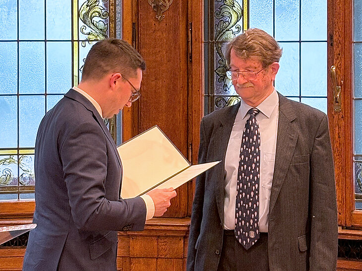 Minister Falko Mohrs und Prof. Dr. Jörg Hartung